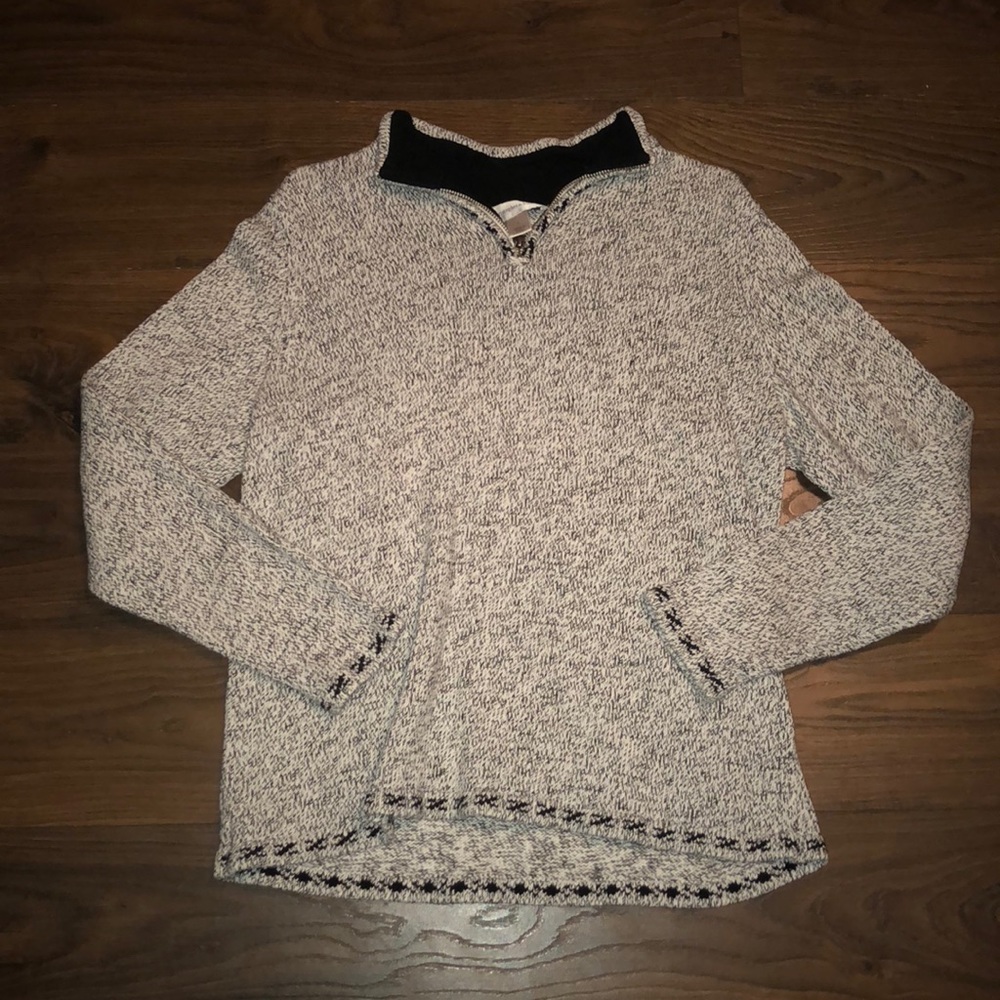 White and black sweater